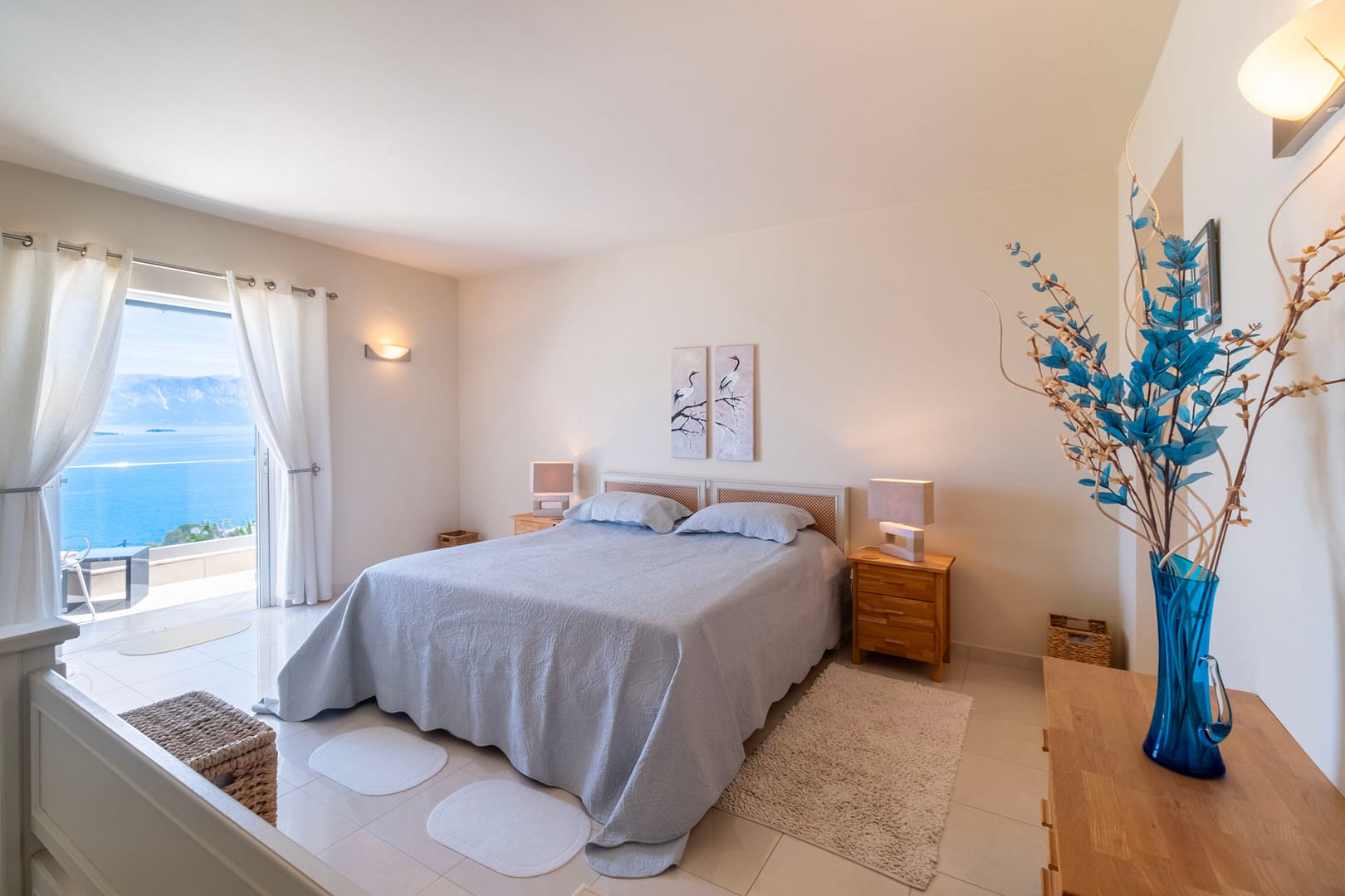 bedroom with balcony and beautiful sea views