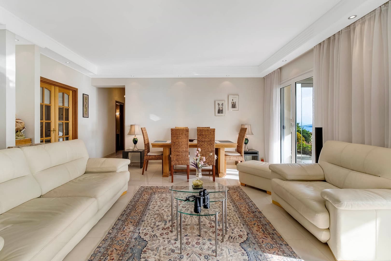 the dining table in the living room is manually crafted by the owner